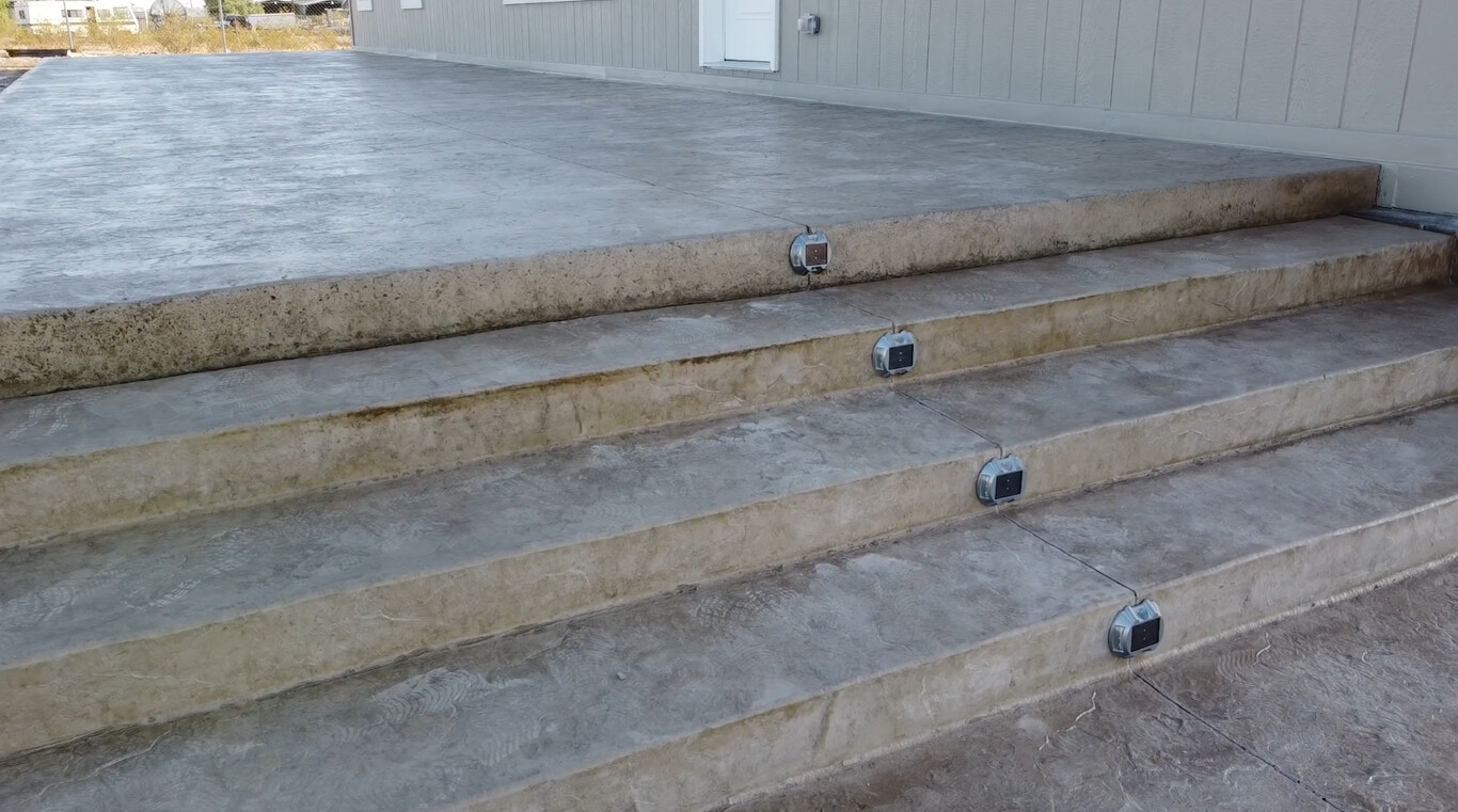 Restored concrete steps with professional lighting in Portland, ME